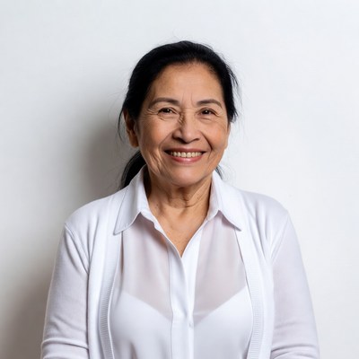 Smiling Asian woman in white blouse