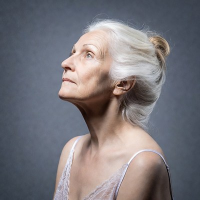 Elderly woman looking up