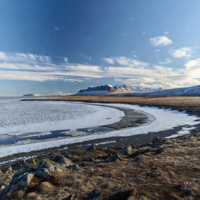 Snowy Curved Bay with Mountains