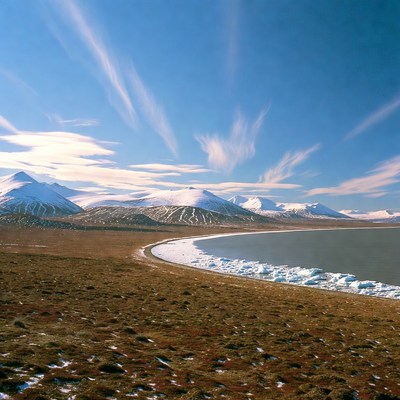 Snowy Mountains by Frozen Lake