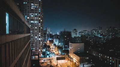Night Cityscape with Skyscrapers and Streetlights