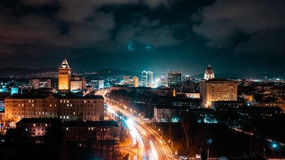 City skyline with light trails at night