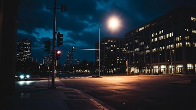 Red traffic light at night intersection