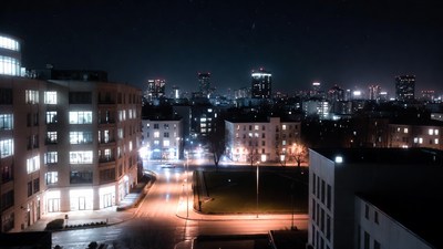 Night cityscape with illuminated buildings
