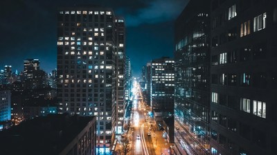 Nighttime City Street with Skyscrapers