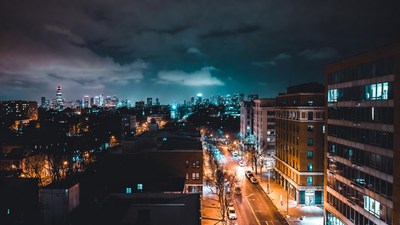 City skyline at night with traffic