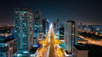 Night cityscape with skyscrapers and highway