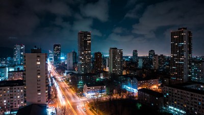 Night city skyline with traffic lights
