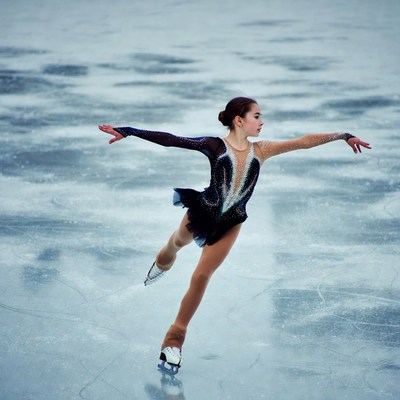 Girl figure skating on ice