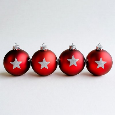 Four Red Christmas Ornaments with Silver Stars