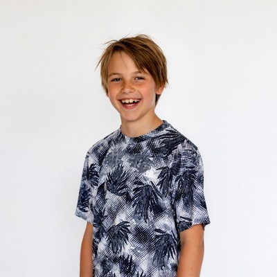 Smiling boy in patterned t-shirt