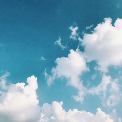 Fluffy White Clouds in Blue Sky