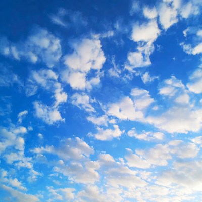Fluffy Clouds in Blue Sky