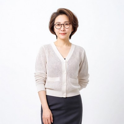Asian woman in white cardigan and skirt