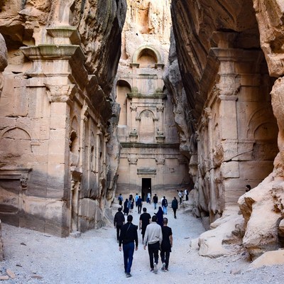 Tourists Walking in Petra Canyon
