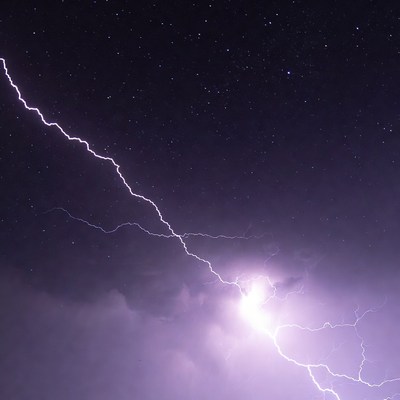 Lightning bolt in starry night sky