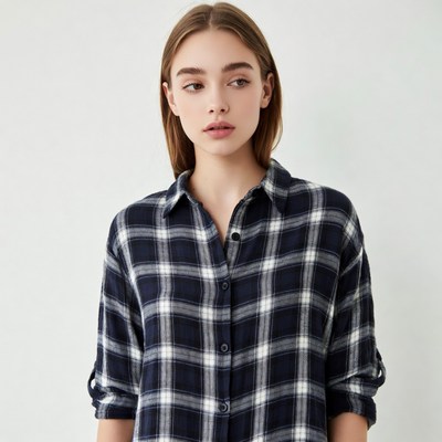 Young woman in plaid shirt