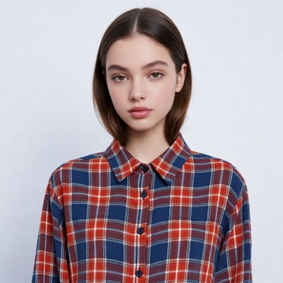 Young woman in plaid shirt