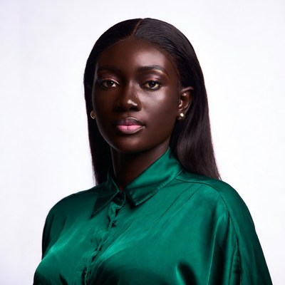 Beautiful African woman in green shirt