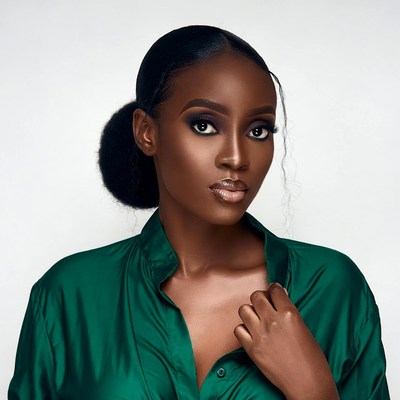 African-American woman in green blouse