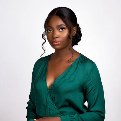 African-American woman in green dress