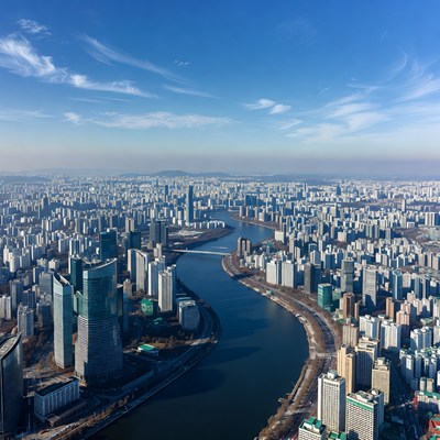 Aerial View of City Skyline with River