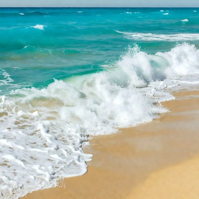 Turquoise Ocean Waves Crashing on Sandy Beach