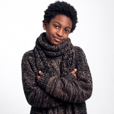 African-American boy in knit sweater scarf