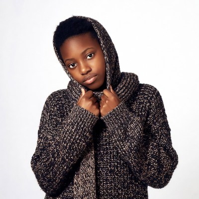 African-American girl in hooded knit sweater
