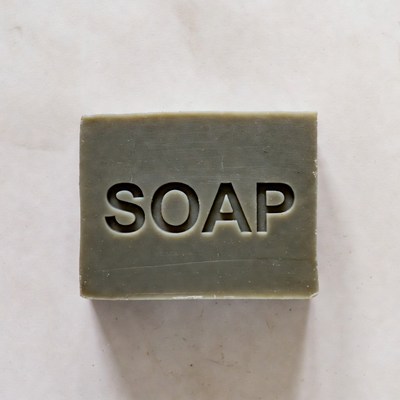 Gray SOAP Bar on White Surface