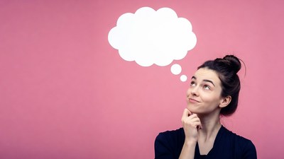Woman thinking with empty speech bubble