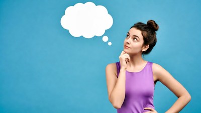 Woman thinking with empty speech bubble