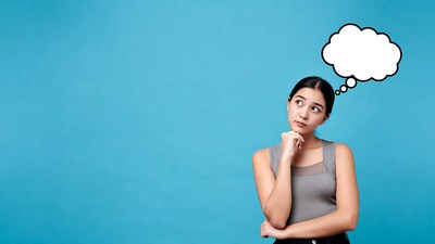 Asian woman thinking with thought bubble