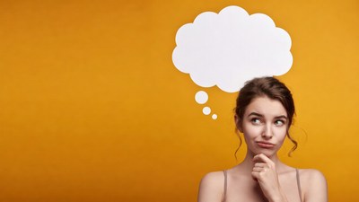 Woman thinking with blank speech bubble