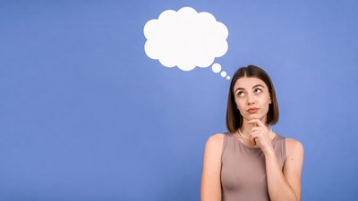 Woman thinking with empty thought bubble