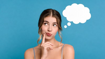 Woman thinking with thought bubble