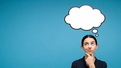 Woman thinking with blank speech bubble