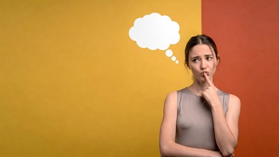 Woman thinking with thought bubble