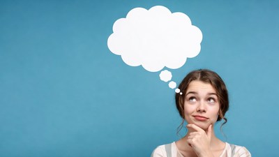 Woman thinking with thought bubble