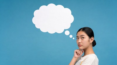 Asian woman thinking with speech bubble