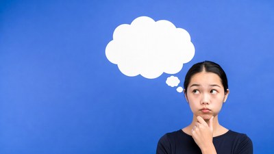 Asian woman thinking with speech bubble