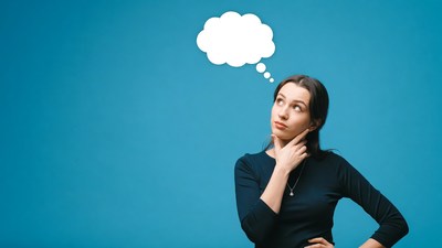 Woman thinking with thought bubble