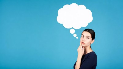 Woman thinking with empty speech bubble