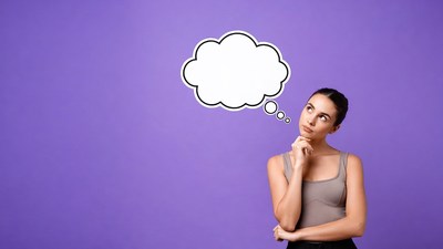 Woman thinking with empty speech bubble
