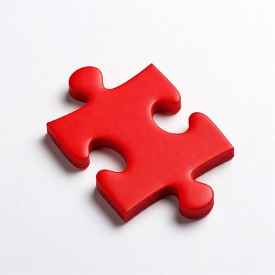 Red puzzle piece on white background
