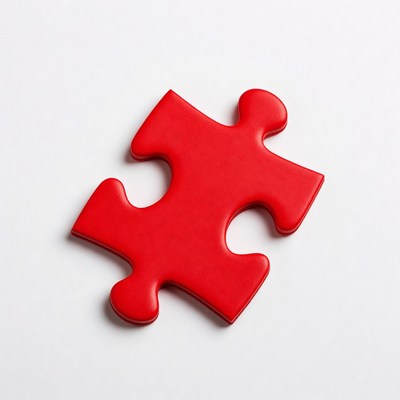 Red puzzle piece on white