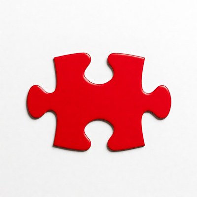Red puzzle piece on white