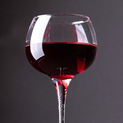 Red Wine Glass on Dark Background