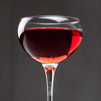 Red Wine Glass on Black Background