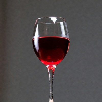 Red Wine Glass on Dark Background